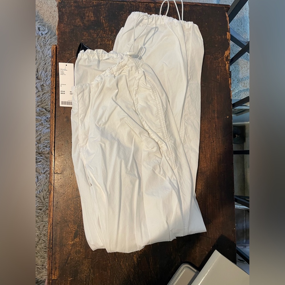 iets frans… white brand new parachute pants